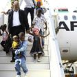 Sudanese children whose parents were reportedly jihadists in Libya get off a plane in Khartoum on June 20, 2017