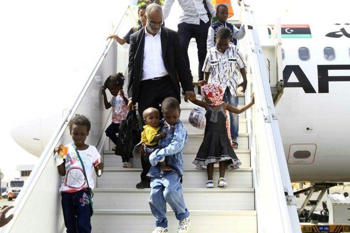 Sudanese children whose parents were reportedly jihadists in Libya get off a plane in Khartoum on June 20, 2017