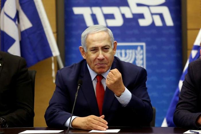 Israeli Prime Minister Benjamin Netanyahu speaking in parliament in Jerusalem on December 24, 2018