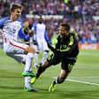 Matt Besler of the United States kicks the ball against Giovani Dos Santos of Mexico in the second half during the FIFA 2018 World Cup Qualifier November 11, 2016 in Columbus, Ohio