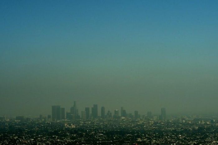 A cloud of smog shrouds the skyline of Los Angeles in California, which has committed to uphold the 2015 Paris climate deal despite Donald Trump's decision to take the US out of it