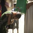 Israel is to supply millions of cubic metres of water to Palestinians including in the Gaza Strip, where a Palestinian boy is seen here cooling off with water from a jerrycan during a heatwave on July 2, 2017