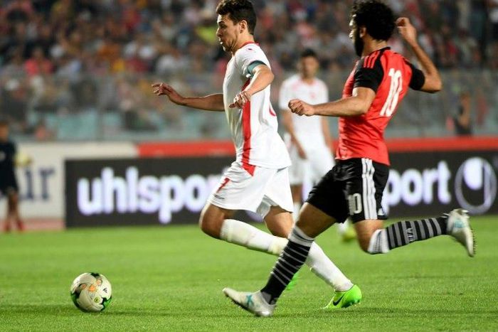 Tunisian forward Youssef Msakni (left) scored the only goal as Tunisia beat Egypt in the African Cup of Nations CAN 2019 preliminary stage qualification match in Rades on June 11, 2017