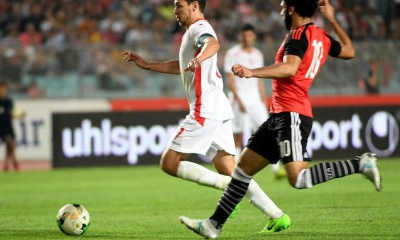 Tunisian forward Youssef Msakni (left) scored the only goal as Tunisia beat Egypt in the African Cup of Nations CAN 2019 preliminary stage qualification match in Rades on June 11, 2017