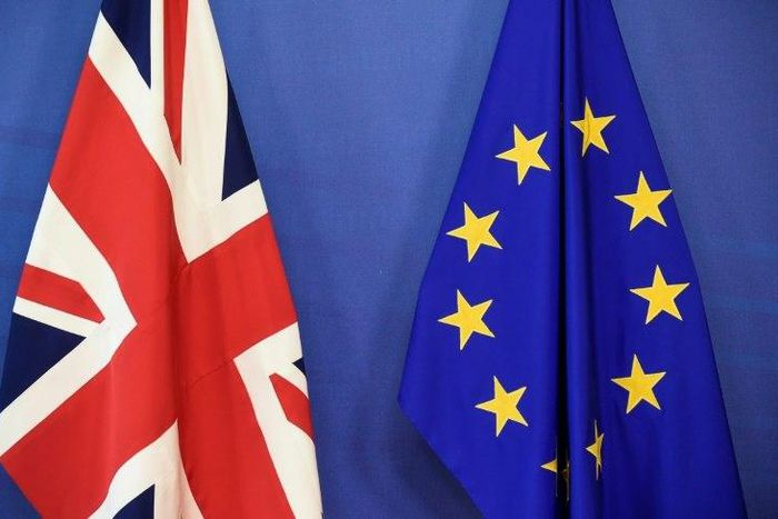 Britain began formal talks with Brussels on Monday to leave the EU