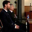 Barcelona's football star Lionel Messi (L) and his father Jorge Horacio Messi face judges in a tax fraud case in court in Barcelona in June 2016