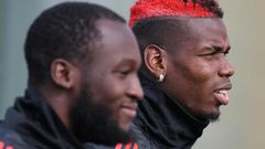 Romelu Lukaku (left) and Paul Pogba (right) were both dropped to the bench for Manchester United's clash with Arsenal on Wednesday