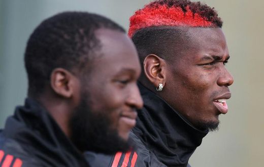 Romelu Lukaku (left) and Paul Pogba (right) were both dropped to the bench for Manchester United's clash with Arsenal on Wednesday