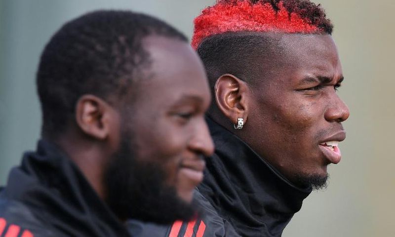 Romelu Lukaku (left) and Paul Pogba (right) were both dropped to the bench for Manchester United's clash with Arsenal on Wednesday