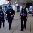 Security at major Australian airports has been strengthened after four men were arrested in Sydney on Saturday and accused of planning an attack