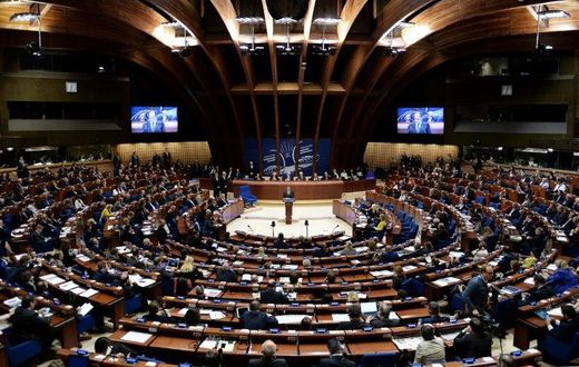 The move by the PACE, seen being addressed by French President Francois Hollande, marks an unprecedented step back for Turkey, which becomes the first of the group's 47 member states to be reinstated on monitoring due to worries over its governance