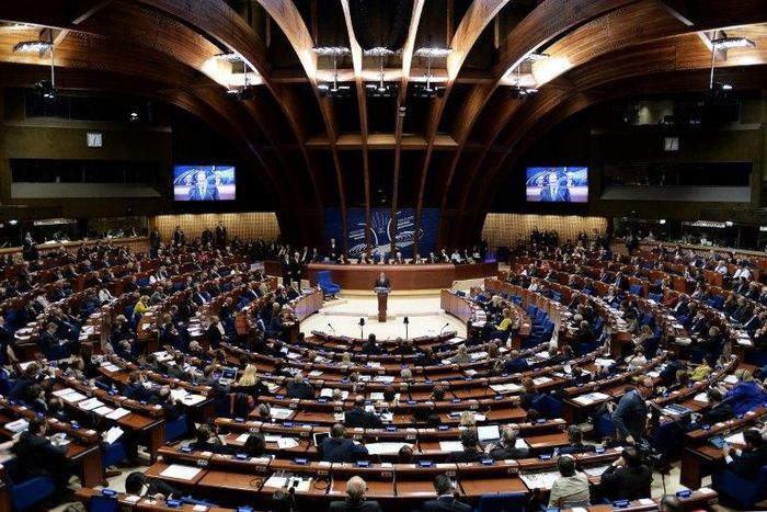 The move by the PACE, seen being addressed by French President Francois Hollande, marks an unprecedented step back for Turkey, which becomes the first of the group's 47 member states to be reinstated on monitoring due to worries over its governance