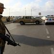Forces loyal to Libya's Government of National Accord (GNA) man a checkpoint in the Hay al-Andalus neighbourhood of Tripoli on March 14, 2017, following clashes between rival armed groups