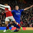 Leicester City defender Robert Huth (R) tackles Arsenal striker Alexis Sanchez during an English Premier League at the Emirates Stadium in London on April 26, 2017