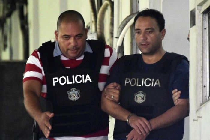 Mexican ex-governor Roberto Borge, center, stands accused of selling state-owned real estate at one percent of its market value, as well as money laundering