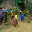Firefighters search for bodies after landslides that have left at least 146 people dead