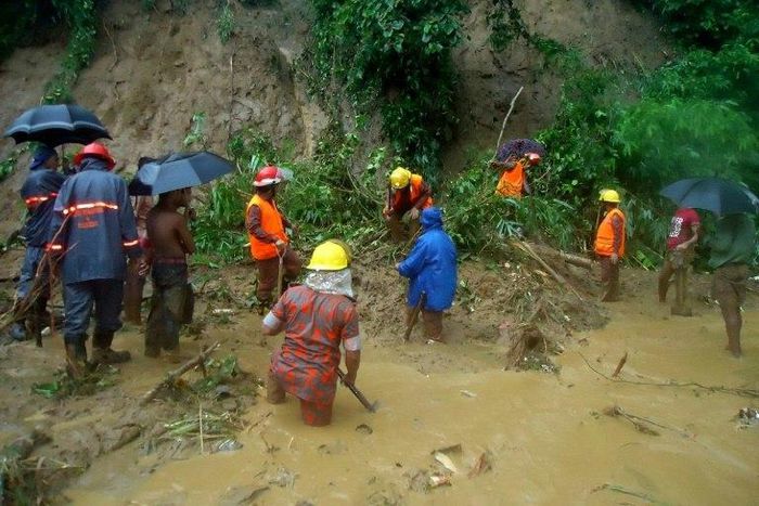 Firefighters search for bodies after landslides that have left at least 146 people dead