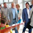 Russian President Vladimir Putin (C) visits a youth holiday facility outside Yalta, Crimea, which was denounced by Kiev as violating its sovereignty