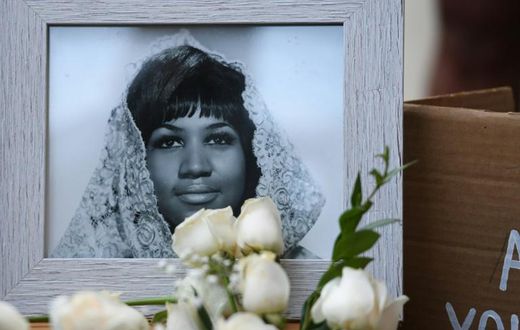 A photograph of American soul legend Aretha Franklin displayed after her death in August 2018, aged 76