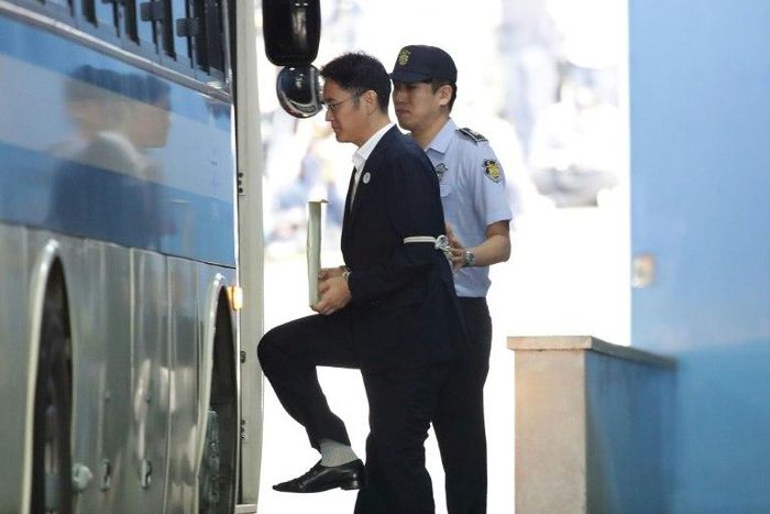 Samsung Group heir Lee Jae-yong leaves the Seoul Central District Court following his conviction for bribing South Korea's ousted president Park Geun-Hye