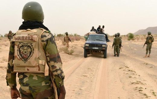 Malian army forces patrol east of Timbuktu in 2015