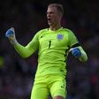 England's goalkeeper Joe Hart celebrates their late equalizer during the group F World Cup qualifying football match against Scotland June 10, 2017