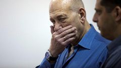 Former Israeli Prime Minister Ehud Olmert gestures during his trial in Jerusalem on May 25, 2015