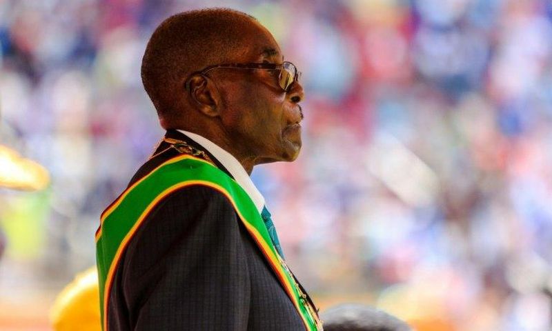 Zimbabwe's President Robert Mugabe reviews the guard of honour during the country's 37th Independence Day celebrations at the National Sports Stadium in Harare April 18, 2017