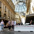 Concrete barriers have been placed at the entrance of the Vittorio Emanuel II gallery near the Duomo in Milan after the attacks in Spain