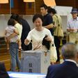 Tokyo residents went to the polls Sunday in a big test for embattled Prime Minister Shinzo Abe, whose ruling Liberal Democratic Party is facing a powerful challenge from the megacity's popular governor for control of the assembly.