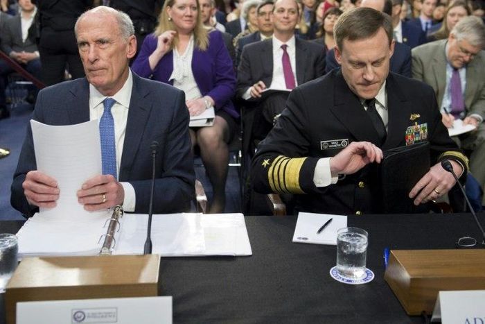 National Security Agency (NSA) Director Michael Rogers (R) and Director of National Intelligence Dan Coats (L) testify before the Senate Intelligence Committee on the probes into Russia meddling in the US election