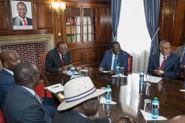 President Uhuru Kenyatta and Raila Odinga at a past meeting with a section of the Building Bridges Initiative team