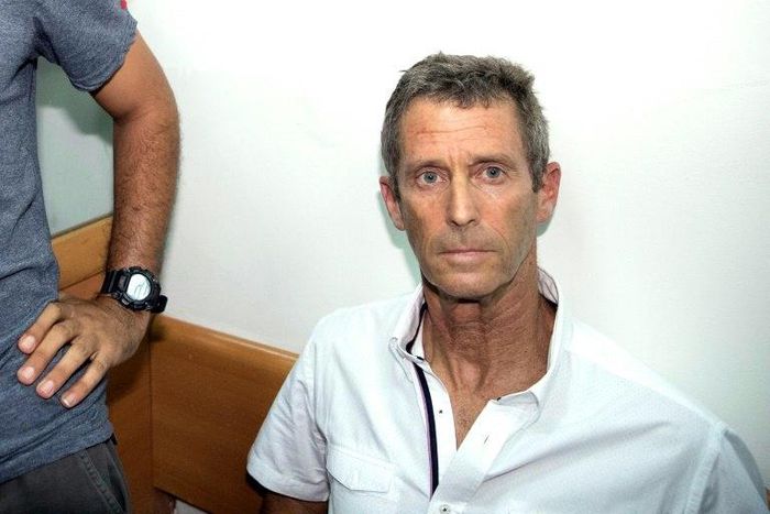 Israeli diamond magnate Beny Steinmetz arrives at a court in Rishon Lezion near Tel Aviv on August 14, 2017