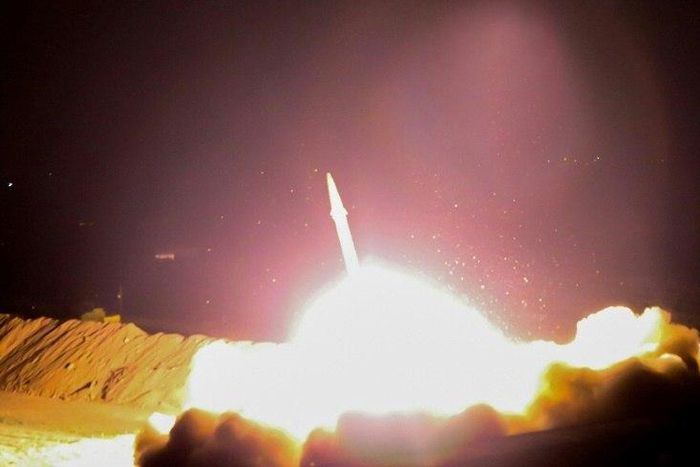 A handout picture provided by Iran's state TV IRIB and released on June 18, 2017 shows Iran's Revolutionary Guards launching a missile from an undisclosed location in western Iran, towards Islamic State group bases in Syria