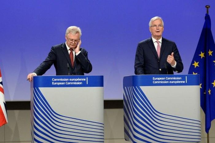 EU Brexit negotiator Michel Barnier (R) says after talks with his British counterpart David Davis that the two sides remain at odds on Britain's divorce bill and over the rights of European citizens living in Britain