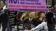 Demonstrators hold a banner at an anti-Trump protest in California, a state which has been at loggerheads with President Donald Trump's administration over various issues