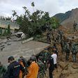 Chinese rescue workers at the scene of the landslide in Guizhou province