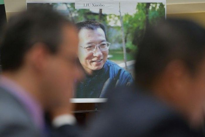 A picture of the late Chinese dissident and Nobel laureate Liu Xiaobo is seen as witnesses testify before a US House subcommittee on his death