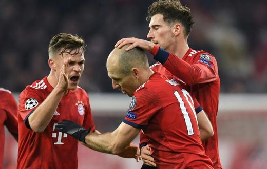 Dutch winger Arjen Robben (C), who turns 35 next month and has said he will retire at the end of the season, is congratulated by his Bayern Munich team-mates after scoring twice in the 5-1 trashing of Benfica a fortnight ago.