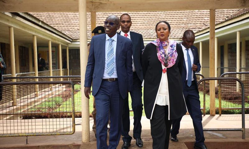 ___9079298___2018___11___7___8___amina+inspecting+exam+papers_1
