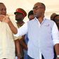 President Uhuru Kenyatta with Mombasa governor Hassan Joho at Shika Adabu grounds Likoni, where Uhuru was issuing title deeds to squatters of the controversial 930-acre Waitiki farm.