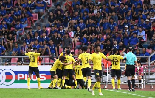 The away supporters were soon celebrating as Malaysia drew level before the half-hour