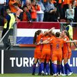 Netherland's team celebrates after a Women's Euro 2017 match against Norway at Galgenwaard Stadium in Utrecht on July 16, 2017