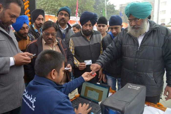 Critics say the massive biometric database, now compulsory for basic procedures such as opening a bank account, violates people's right to privacy