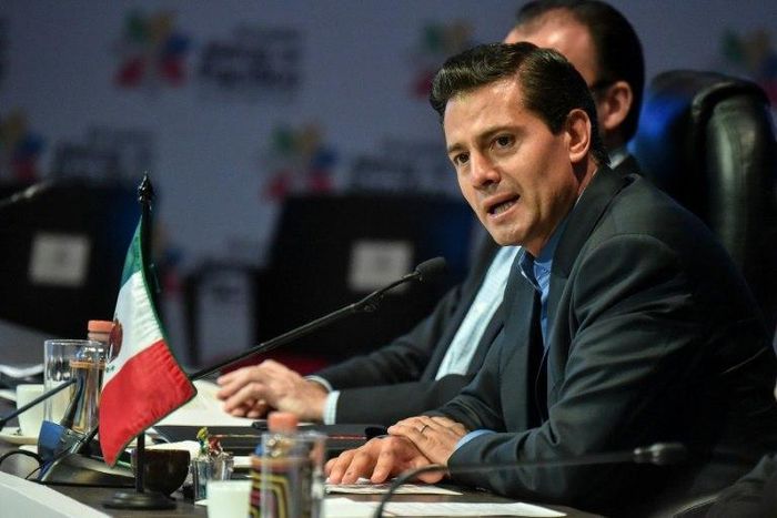 Mexican President Enrique Pena Nieto, seen here at a summit in Colombia, meets later this week in Germany with US President Donald Trump but Mexican officials are downplaying expectations of any settling of their "substantive differences"
