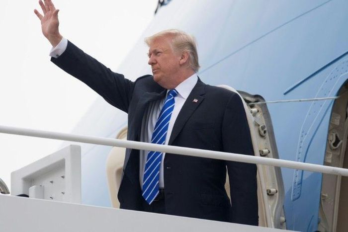 US President Donald Trump boards Air Force One prior to departure from Andrews Air Force Base in Maryland, July 5, 2017, as he travels on a 4-day trip to Poland and Germany