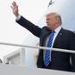 US President Donald Trump boards Air Force One prior to departure from Andrews Air Force Base in Maryland, July 5, 2017, as he travels on a 4-day trip to Poland and Germany