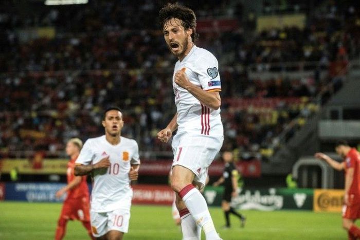 Spain's midfielder David Silva (C) celebrates after scoring a goal on June 11, 2017