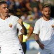 Roma's defender Aleksandar Kolarov (L) celebrates after scoring a goal against Atalanta on August 20, 2017 at the Atleti Azzurri d'Italia stadium in Bergamo