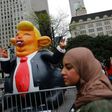 Protesters gather outside Trump Tower in New York to demonstrate against US President Donald Trump on August 14, 2017